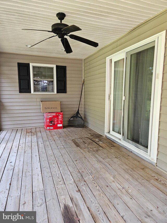 wooden terrace with ceiling fan