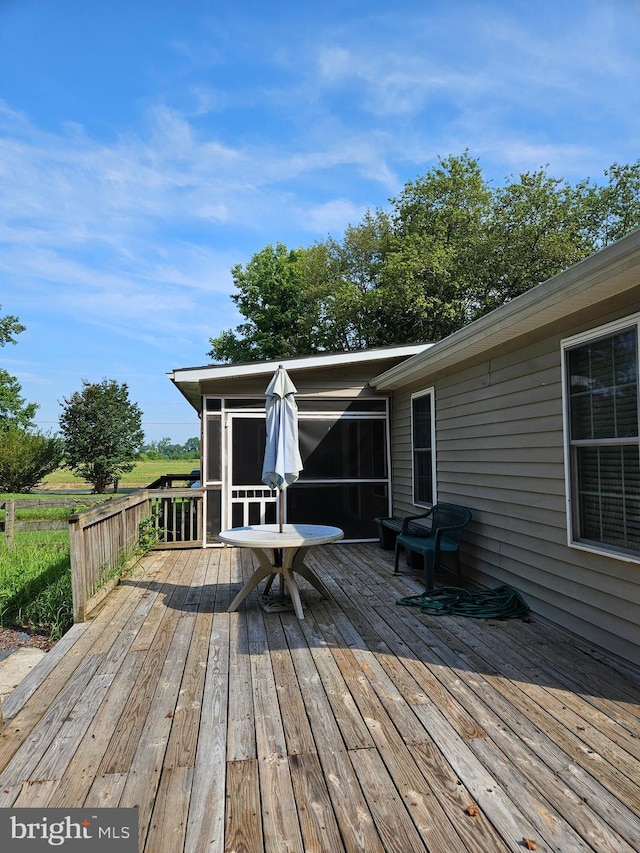 deck featuring a sunroom