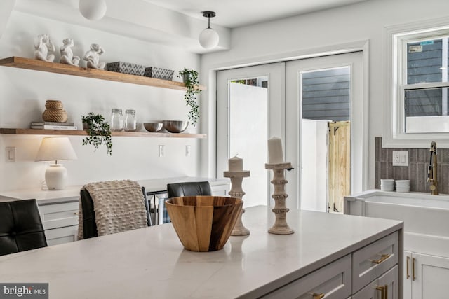 dining space featuring sink and a wealth of natural light