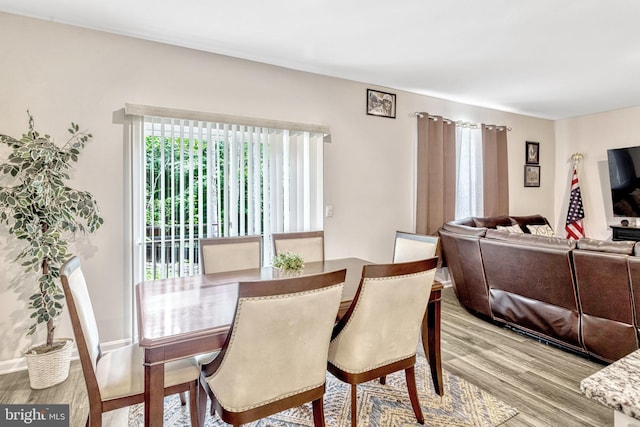 dining space featuring light hardwood / wood-style flooring