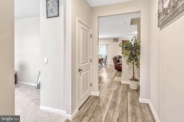 hall with light wood-type flooring