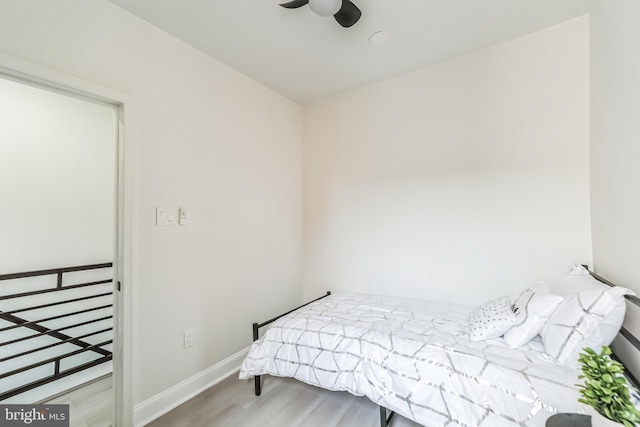 bedroom featuring ceiling fan and hardwood / wood-style floors