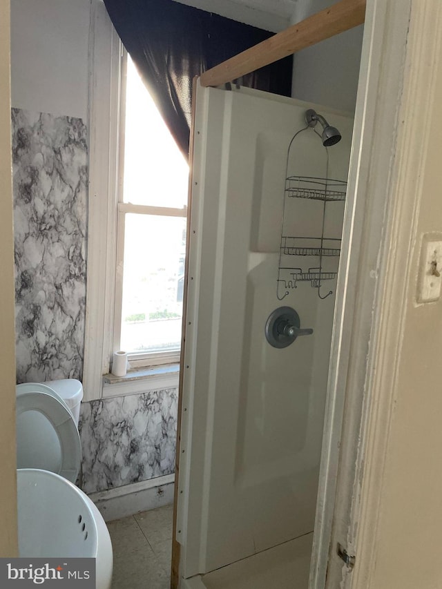 bathroom featuring tile patterned flooring