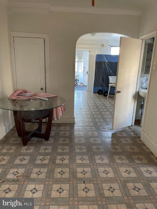 hallway with crown molding