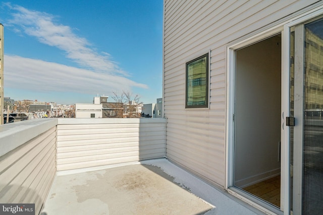 view of patio / terrace with a balcony