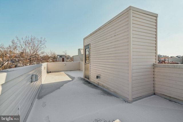 view of side of property with a patio