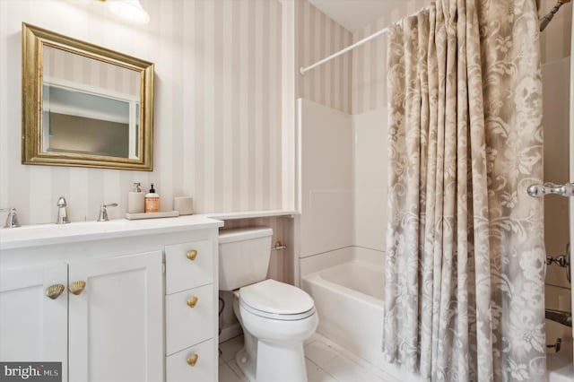 full bathroom with vanity, toilet, and shower / bath combo with shower curtain