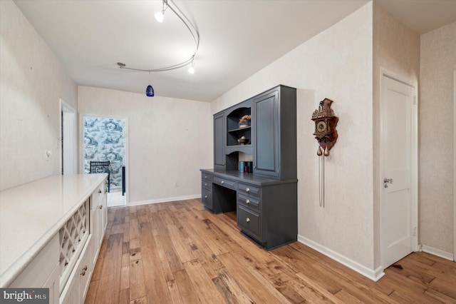 office space with light hardwood / wood-style floors