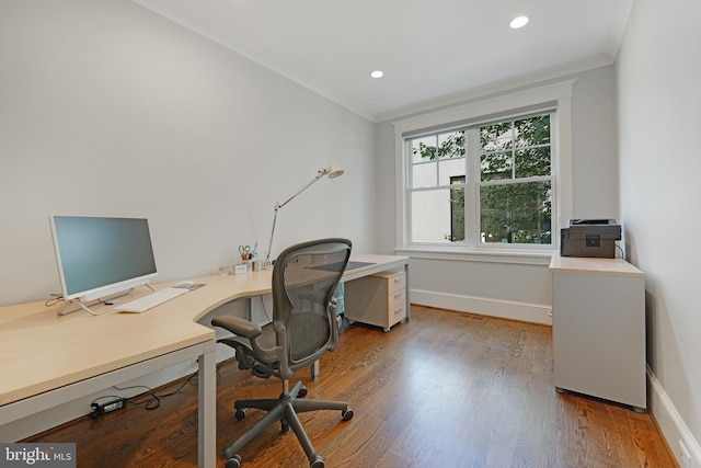 office area with hardwood / wood-style floors and crown molding