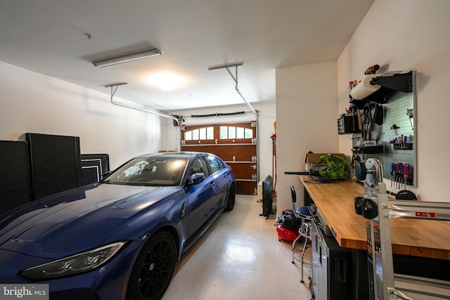 garage with a workshop area