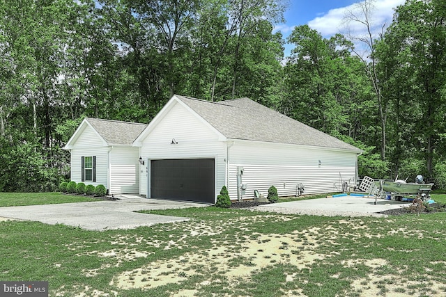 garage with a lawn