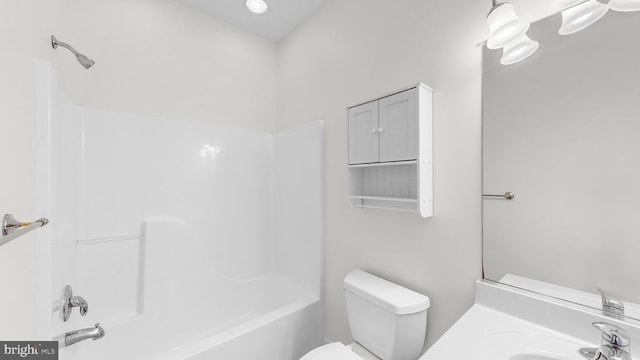 full bathroom featuring vanity,  shower combination, and toilet