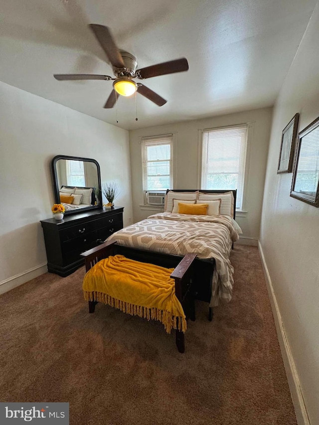 carpeted bedroom featuring cooling unit and ceiling fan