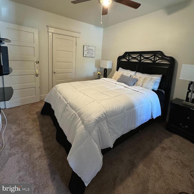 carpeted bedroom featuring ceiling fan