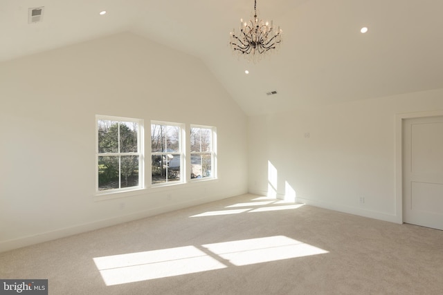 interior space featuring light carpet, high vaulted ceiling, and a notable chandelier