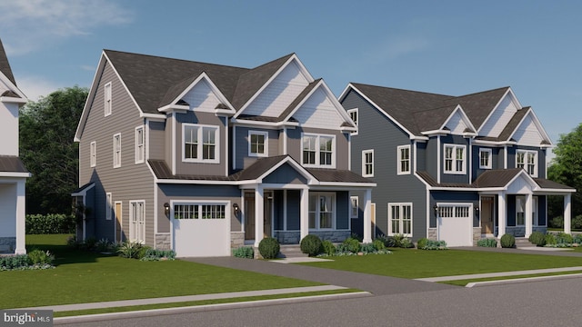 view of front facade featuring a front yard and a garage