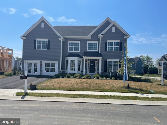 view of front of home featuring a front yard