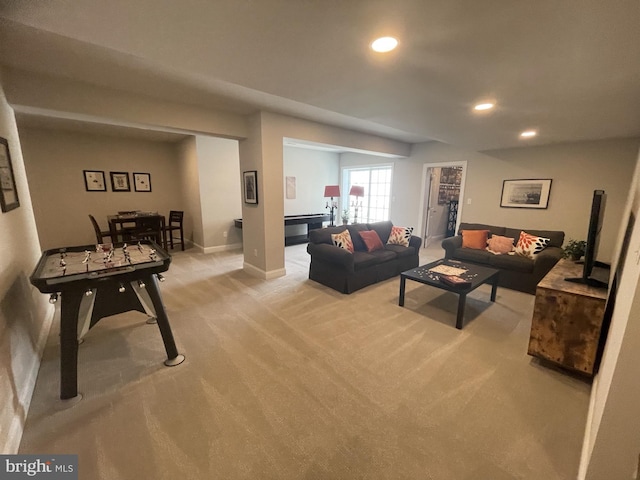 living room featuring light colored carpet