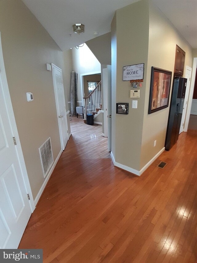 hall featuring hardwood / wood-style flooring