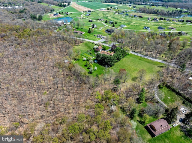 bird's eye view with a water view and a rural view