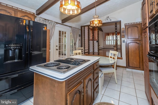 kitchen with vaulted ceiling with beams, light tile patterned floors, a kitchen island, black appliances, and hanging light fixtures