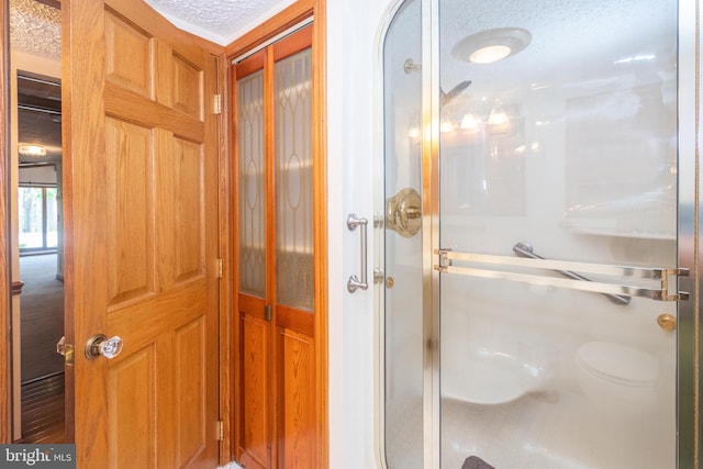 bathroom with a textured ceiling