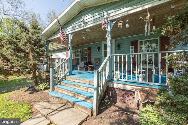 doorway to property with a porch