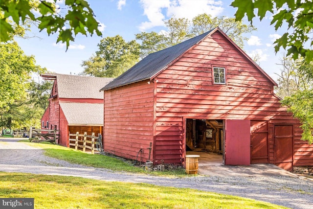 exterior space featuring an outbuilding