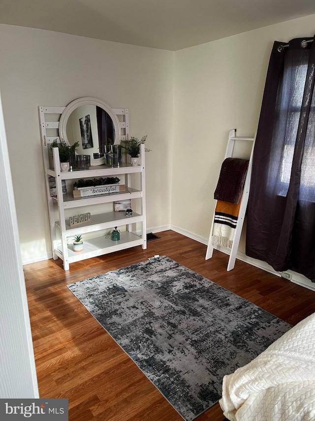 living area featuring hardwood / wood-style floors