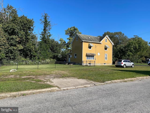 view of property exterior featuring a yard