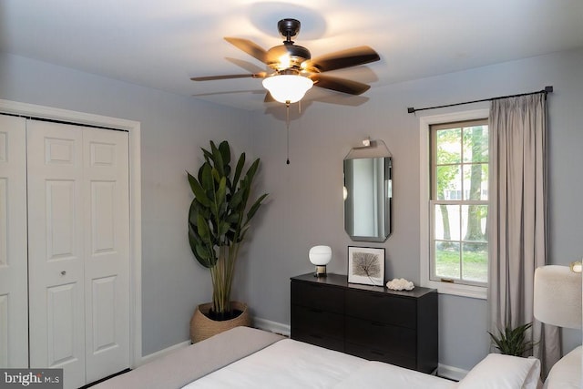 bedroom featuring a closet and ceiling fan