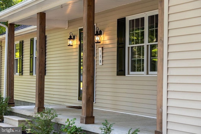 entrance to property with a porch