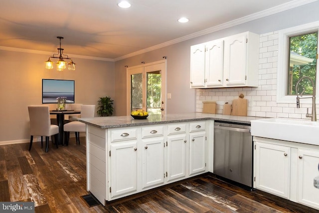 kitchen featuring kitchen peninsula, decorative light fixtures, dishwasher, dark hardwood / wood-style floors, and white cabinetry