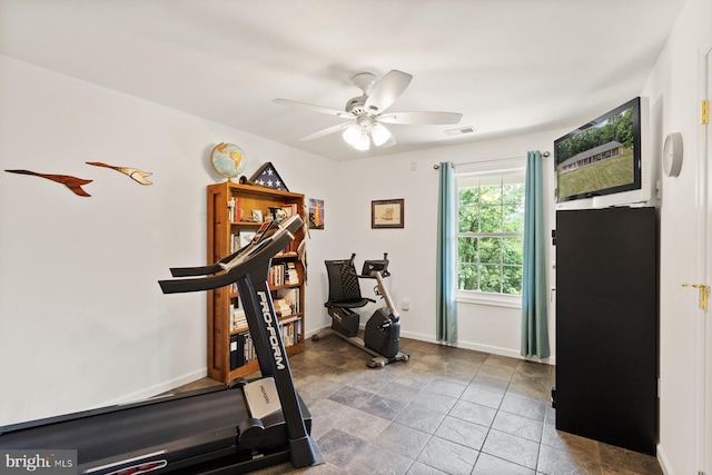 workout area featuring ceiling fan