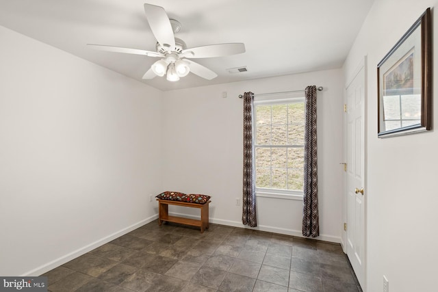 empty room with ceiling fan