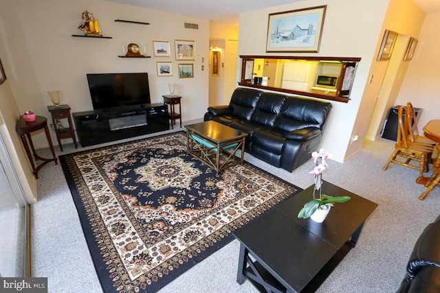 living room featuring carpet flooring