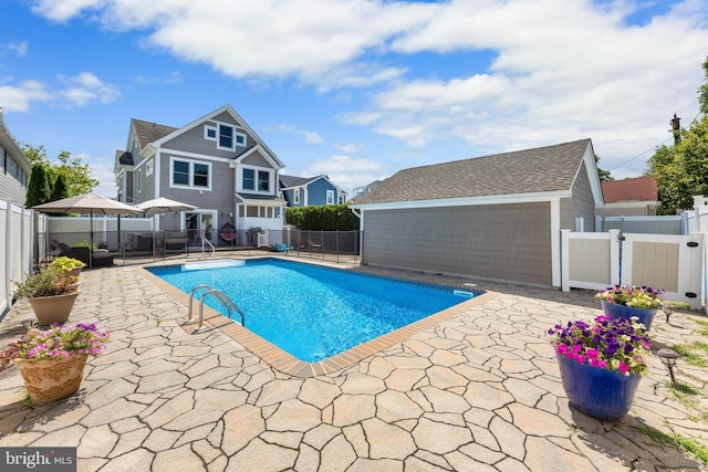 view of pool featuring a patio area