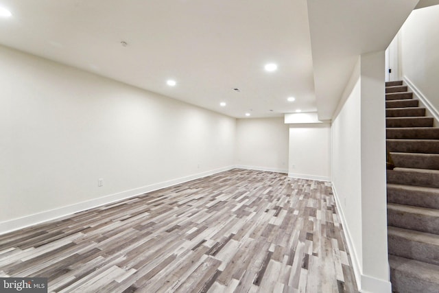 basement featuring light hardwood / wood-style floors