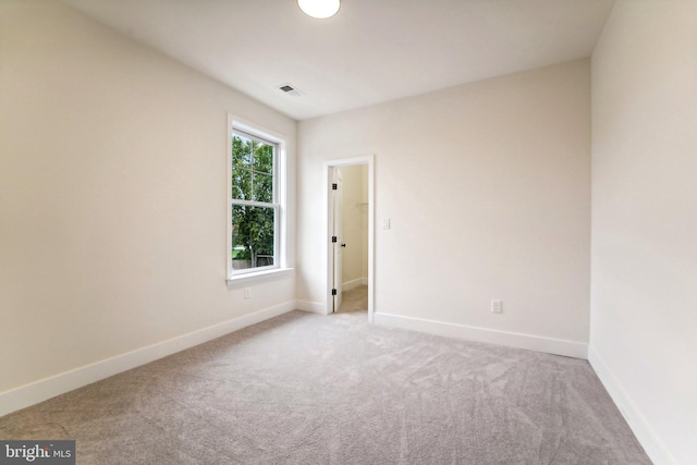 view of carpeted spare room