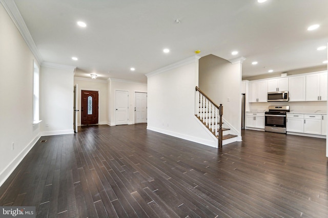 unfurnished living room with dark wood-type flooring and crown molding