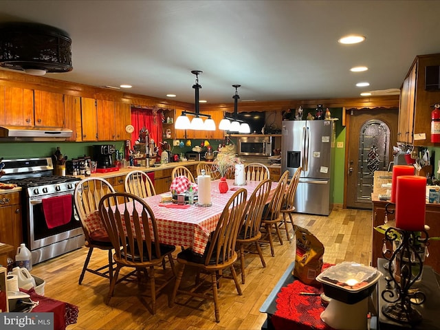 dining room featuring light hardwood / wood-style flooring