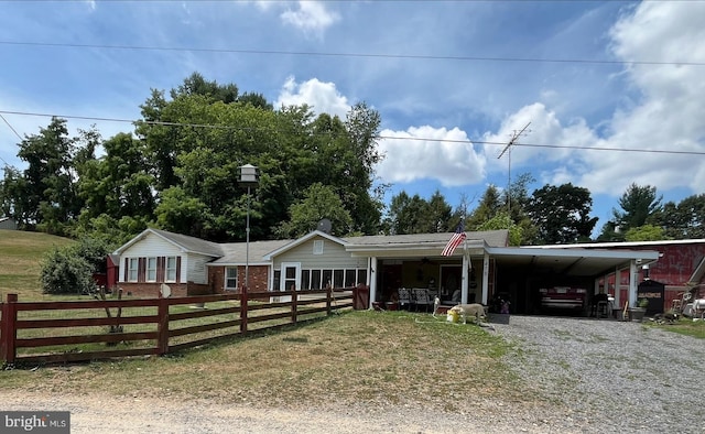 view of front facade featuring a carport