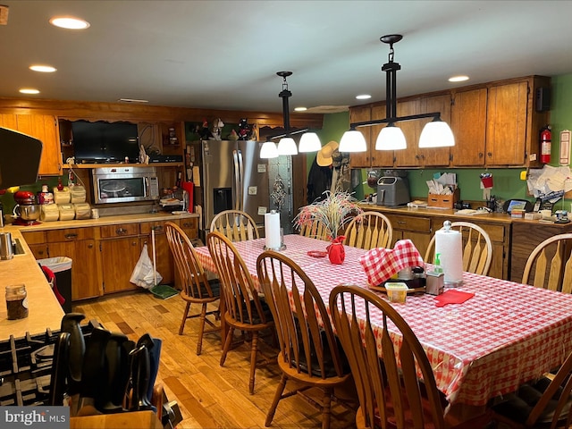 dining area featuring light hardwood / wood-style flooring