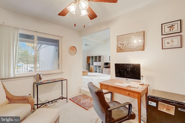 home office with light colored carpet and lofted ceiling