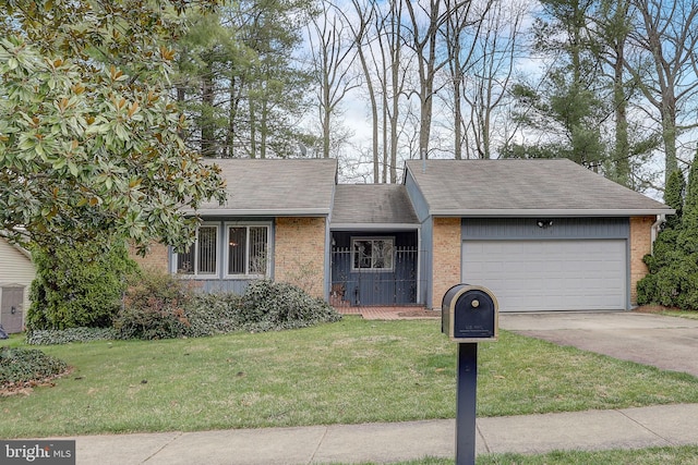 ranch-style home with a front lawn and a garage