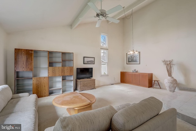 living room featuring beam ceiling, light carpet, high vaulted ceiling, and ceiling fan with notable chandelier