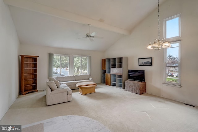 living room with carpet flooring, beamed ceiling, ceiling fan with notable chandelier, and high vaulted ceiling