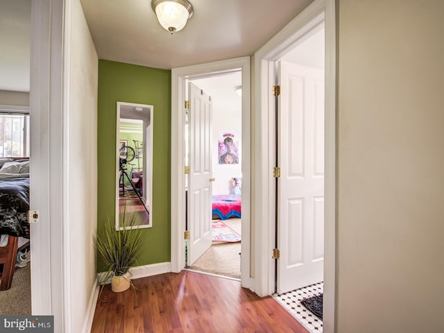 hall featuring wood-type flooring