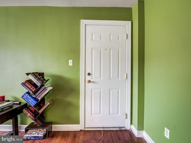 entrance foyer with dark hardwood / wood-style floors