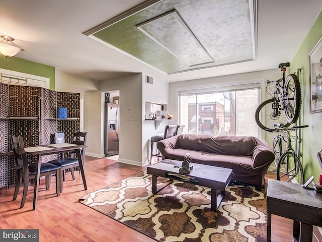 living room with hardwood / wood-style flooring